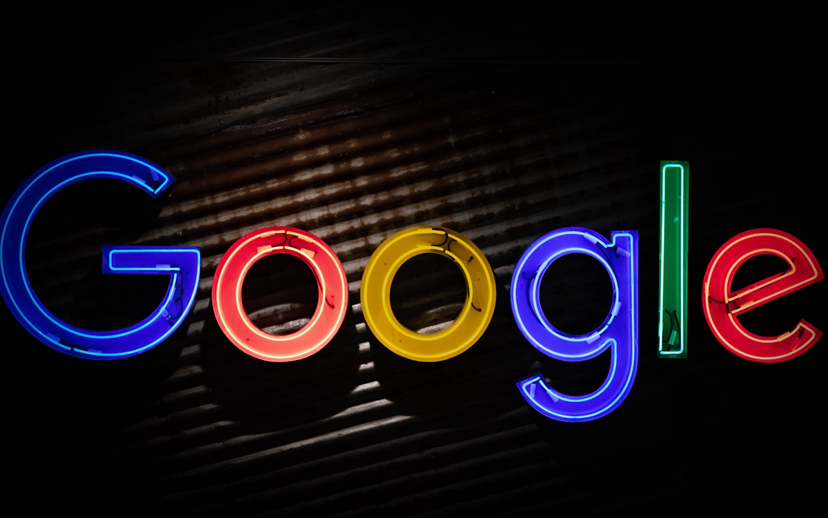 Photo by Mitchell Luo Google logo neon light signage