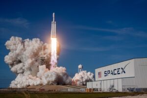 Headline: SpaceX sets a take-it-or-leave-it $135 IPO price and targets an unusual 30% retail allocation ahead of Friday’s debut