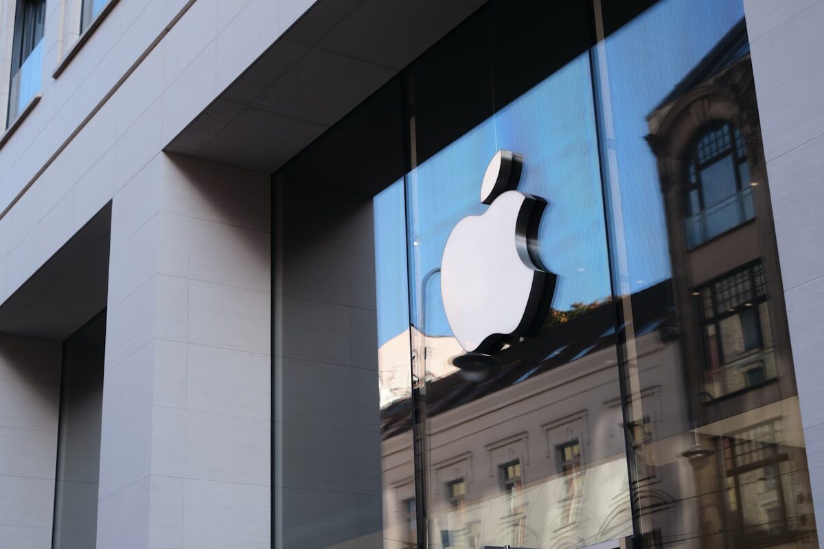 Apple logo reflected on a building window