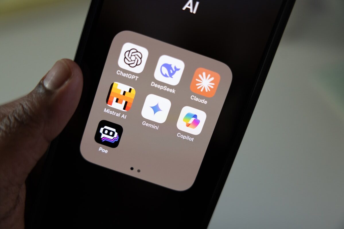 A person holding a smart phone in their hand