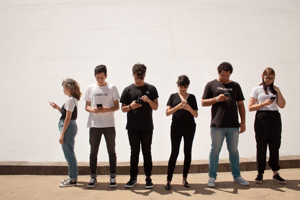 Teenager group of people standing on brown floor